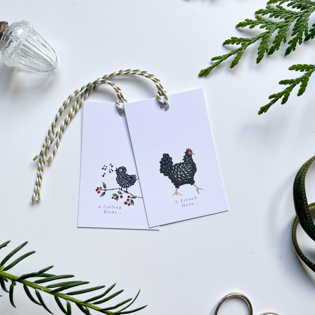 french hens & calling birds gift tags with hand illustrated 12 days of christmas characters strung with stripey bakers twine